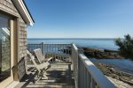 Second floor balcony at the end of the hallway looking at the ocean.